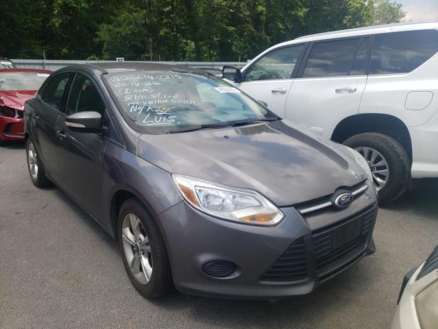 FORD FOCUS SE 2014 with VIN 1FADP3F24EL262218 - Photo from auction