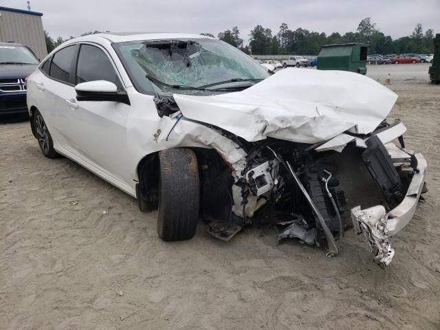 HONDA CIVIC EX 2018 with VIN 19XFC2F7XJE038846 - Photo from auction