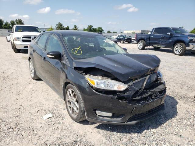FORD FOCUS SE 2015 with VIN 1FADP3F26FL215659 - Photo from auction