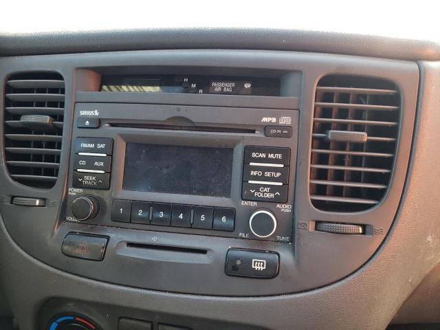 Photo 9 from auction – 2011 KIA RIO BASE with VIN KNADH4A32B6848954