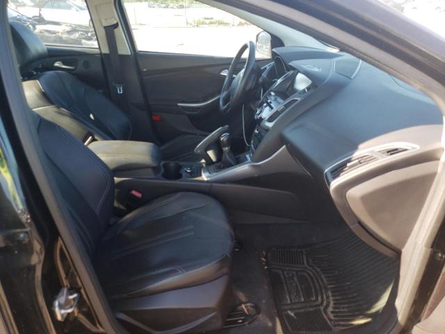 Photo 5 from auction – 2012 FORD FOCUS TITA with VIN 1FAHP3J24CL409434