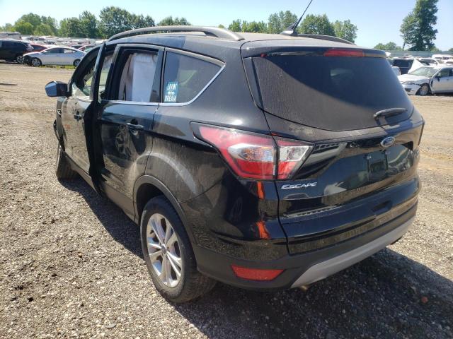 Photo 3 from auction – 2018 FORD ESCAPE SE with VIN 1FMCU0GD4JUC11587