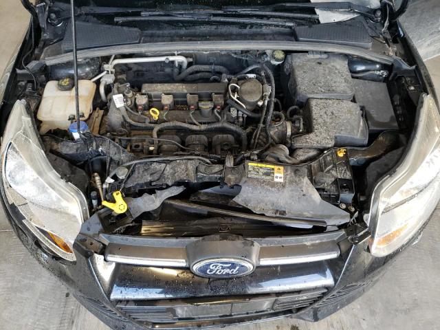 Foto 7 de la subasta – 2014 FORD FOCUS SE con VIN 1FADP3F21EL241665