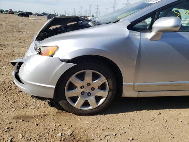 Photo 9 from auction – 2011 HONDA CIVIC LX with VIN 19XFA1F5XBE002297