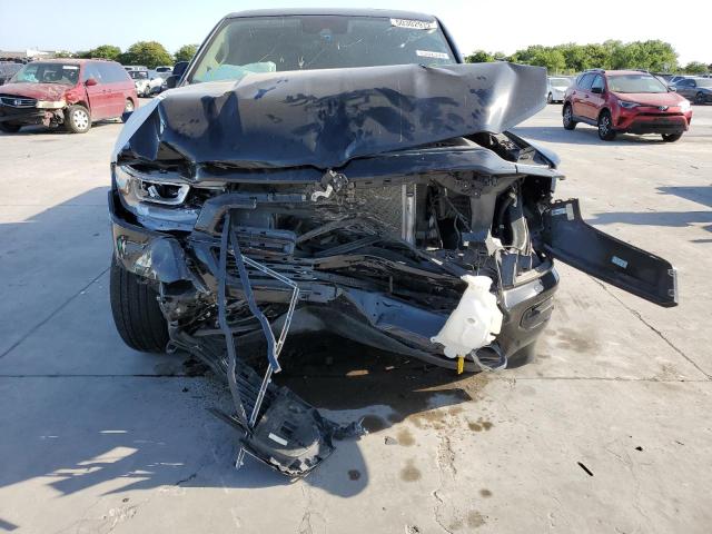 Photo 9 from auction – 2021 RAM 1500 LARAM with VIN 1C6SRFJT4MN515741