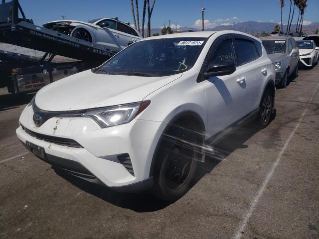 Photo 2 from auction – 2018 TOYOTA RAV4 LE with VIN 2T3ZFREV2JW473216