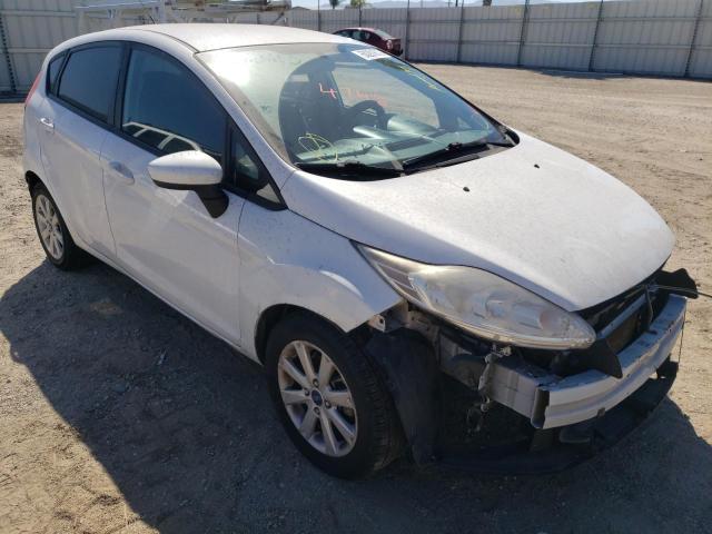 FORD FIESTA SE 2011 with VIN 3FADP4EJ1BM240069 - Photo from auction