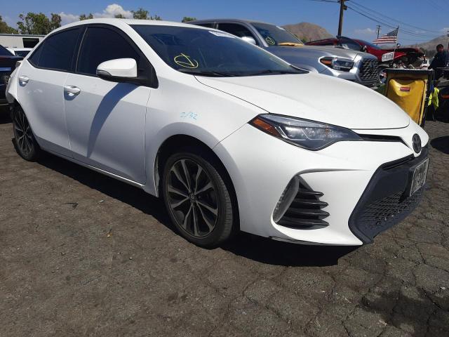 TOYOTA COROLLA L 2018 with VIN 5YFBURHE3JP772632 - Photo from auction