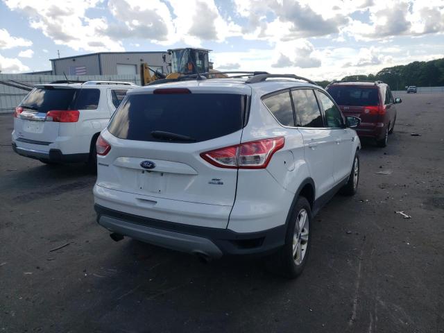 Photo 4 from auction – 2016 FORD ESCAPE SE with VIN 1FMCU9G95GUC17634