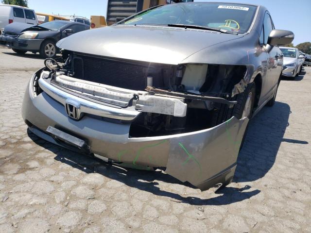 Photo 9 from auction – 2006 HONDA CIVIC HYBR with VIN JHMFA36206S004045