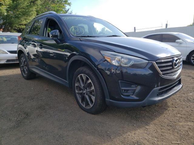 MAZDA CX-5 GT 2016 with VIN JM3KE4DY4G0626038 - Photo from auction
