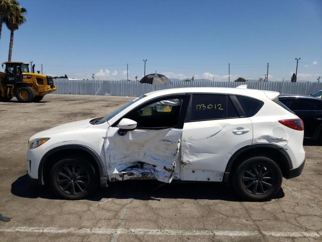 Photo 9 from auction – 2015 MAZDA CX-5 SPORT with VIN JM3KE2BE8F0490914