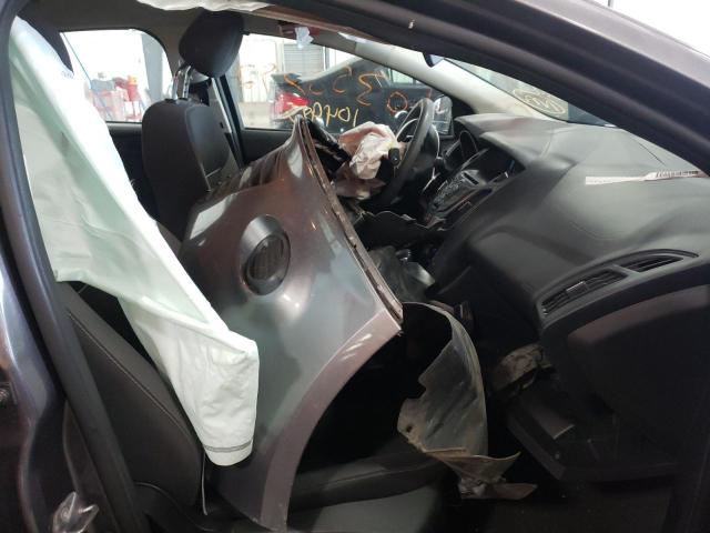 Foto 5 de la subasta – 2014 FORD FOCUS con VIN 1FADP3E24EL247509