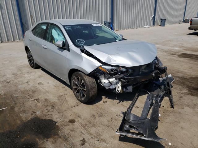 TOYOTA COROLLA L 2019 with VIN 5YFBURHE8KP864711 - Photo from auction