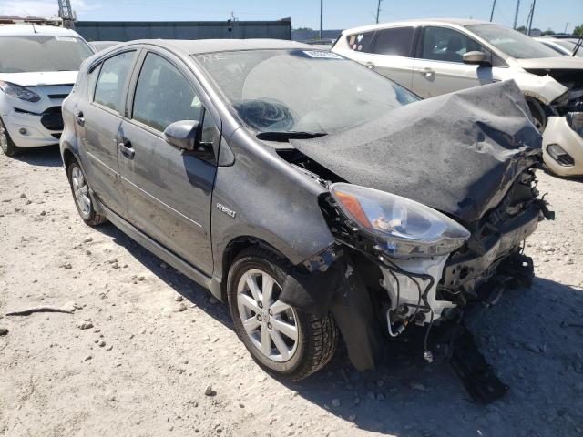 TOYOTA PRIUS C 2017 with VIN JTDKDTB35H1591213 - Photo from auction