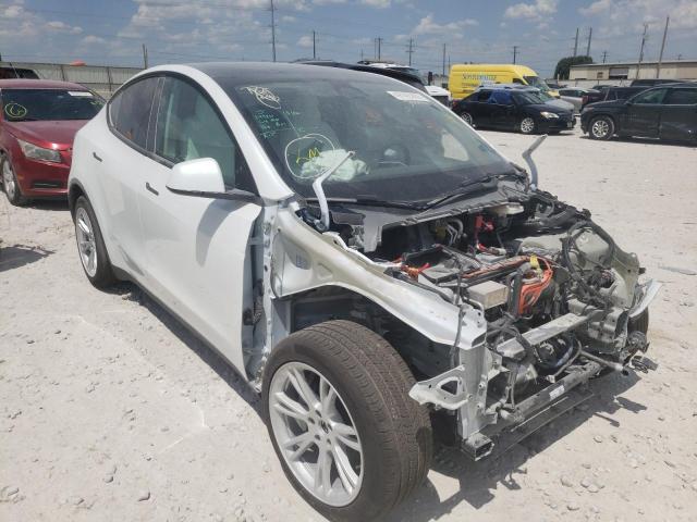 TESLA MODEL Y 2022 with VIN 7SAYGDEE9NF390974 - Photo from auction