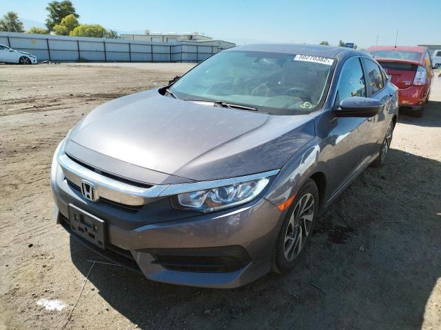 Photo 2 from auction – 2018 HONDA CIVIC EX with VIN 19XFC2F78JE202031