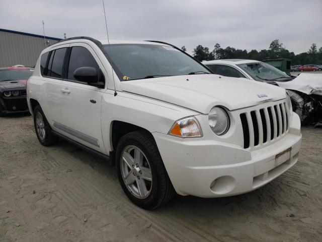 JEEP COMPASS SP 2010 with VIN 1J4NF4FB9AD636201 - Photo from auction