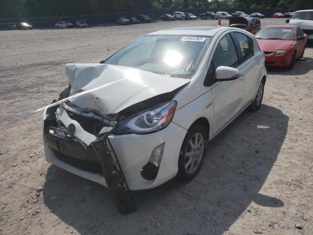 Photo 2 from auction – 2015 TOYOTA PRIUS C with VIN JTDKDTB35F1090416