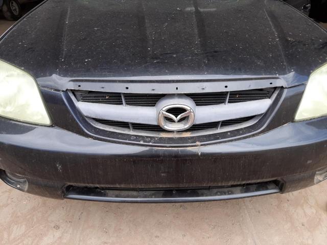 Photo 9 from auction – 2004 MAZDA TRIBUTE LX with VIN 4F2YZ04164KM17841
