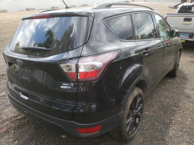 Photo 4 from auction – 2017 FORD ESCAPE SE with VIN 1FMCU9GD9HUC92049