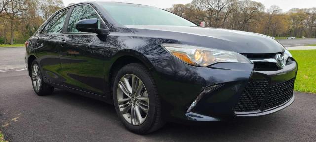 TOYOTA CAMRY LE 2016 with VIN 4T1BF1FK9GU127964 - Photo from auction