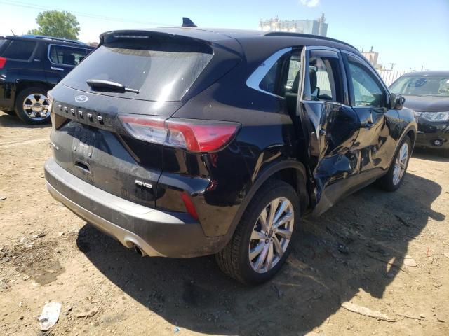 Photo 4 from auction – 2021 FORD ESCAPE TIT with VIN 1FMCU9J90MUA36462