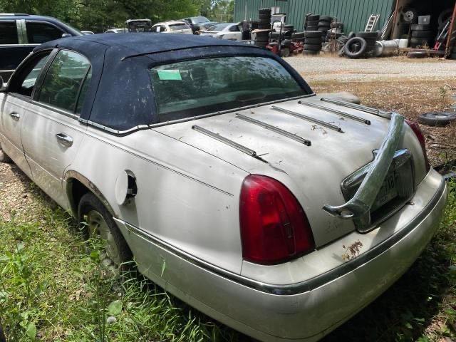Photo 3 from auction – 1998 LINCOLN TOWN CAR E with VIN 1LNFM81W4WY675470