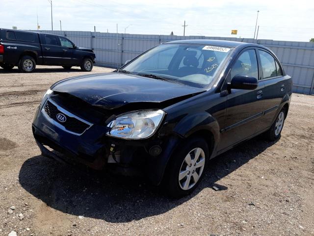 Photo 2 from auction – 2011 KIA RIO BASE with VIN KNADH4A37B6922529
