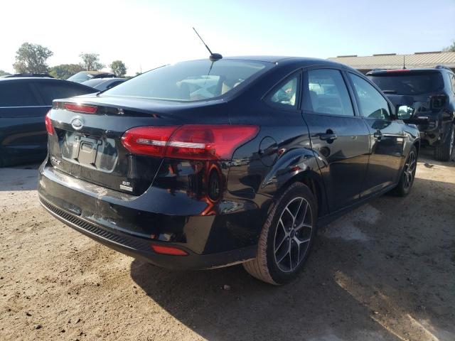 Photo 4 from auction – 2018 FORD FOCUS SE with VIN 1FADP3FE6JL201800