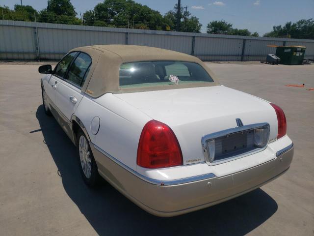 Photo 3 from auction – 2004 LINCOLN TOWN CAR E with VIN 1LNHM81WX4Y611441