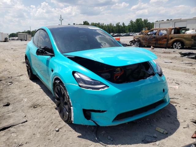 TESLA MODEL Y 2021 with VIN 5YJYGDEFXMF261663 - Photo from auction