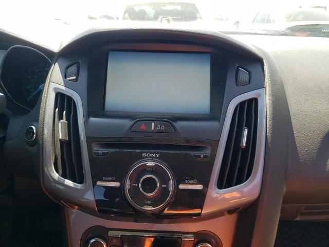 Photo 9 from auction – 2014 FORD FOCUS TITA with VIN 1FADP3J28EL463367