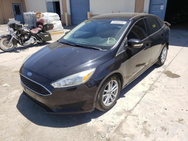 Photo 2 from auction – 2017 FORD FOCUS SE with VIN 1FADP3F20HL211268
