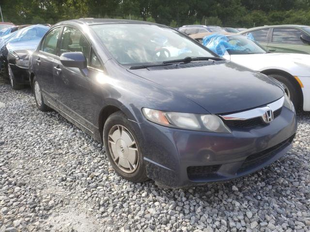 HONDA CIVIC HYBR 2010 with VIN JHMFA3F24AS005028 - Photo from auction