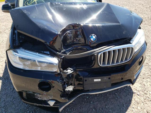 Photo 9 from auction – 2015 BMW X5 XDRIVE3 with VIN 5UXKR0C50F0P00033