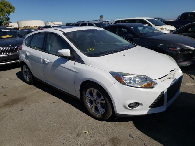 FORD FOCUS SE 2014 with VIN 1FADP3K27EL272215 - Photo from auction