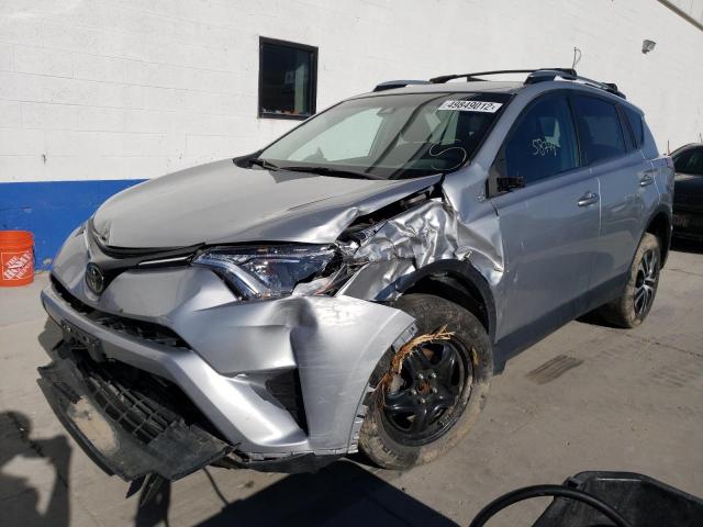 Photo 2 from auction – 2018 TOYOTA RAV4 LE with VIN 2T3BFREVXJW707202