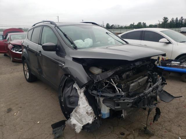 FORD ESCAPE SE 2018 with VIN 1FMCU9GD5JUC40455 - Photo from auction