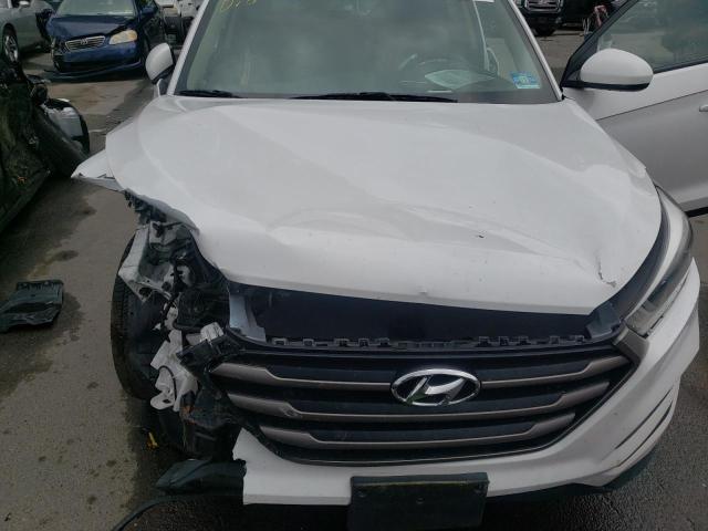 Photo 7 from auction – 2016 HYUNDAI TUCSON SE with VIN KM8J23A41GU107882
