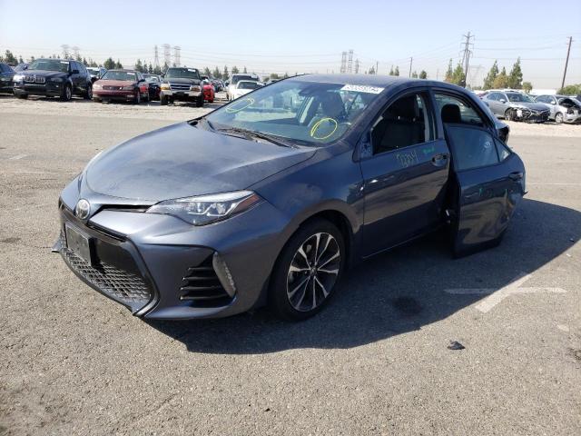 Photo 2 from auction – 2018 TOYOTA COROLLA L with VIN 5YFBURHE2JP800632