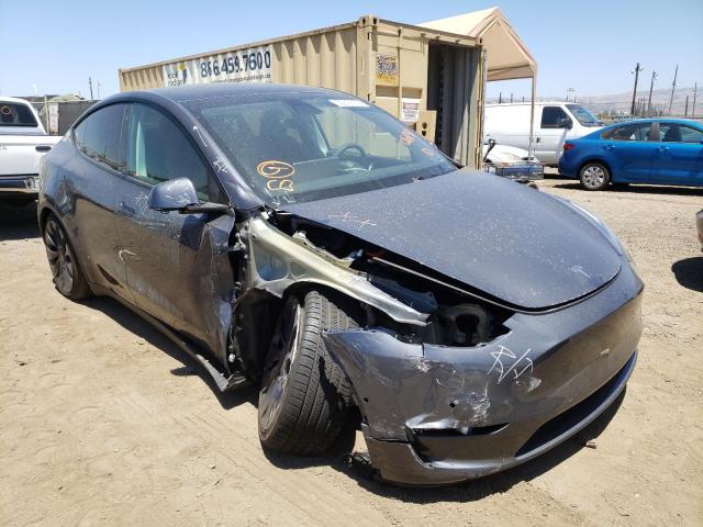 TESLA MODEL Y 2022 with VIN 7SAYGDEFXNF342067 - Photo from auction