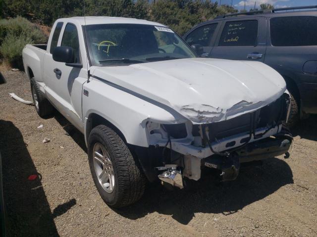 DODGE DAKOTA SLT 2011 with VIN 1D7RW3BP0BS631670 - Photo from auction