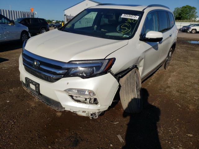 Photo 2 from auction – 2016 HONDA PILOT TOUR with VIN 5FNYF6H90GB125972