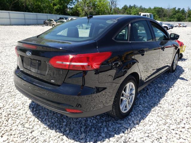 Photo 4 from auction – 2017 FORD FOCUS SE with VIN 1FADP3F29HL315919