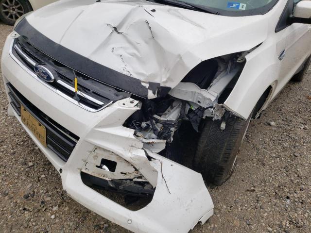Photo 9 from auction – 2016 FORD ESCAPE TIT with VIN 1FMCU9J90GUB05655