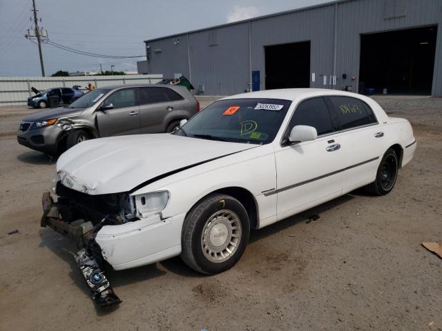 Photo 2 from auction – 2002 LINCOLN TOWN CAR E with VIN 1LNHM81W22Y626500