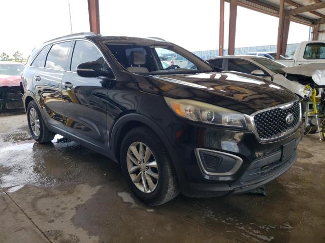 KIA SORENTO LX 2016 with VIN 5XYPG4A57GG034629 - Photo from auction