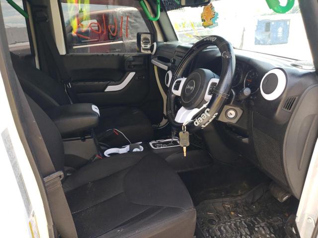 Photo 5 from auction – 2015 JEEP WRANGLER U with VIN 1C4BJWKG7FL679565