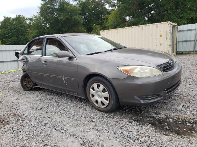 TOYOTA CAMRY LE 2004 with VIN 4T1BE32K64U877483 - Photo from auction